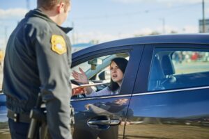Is it illegal to drive without a license on you?